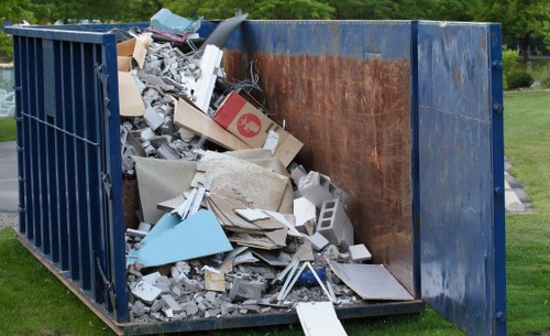 Residents participating in community waste removal